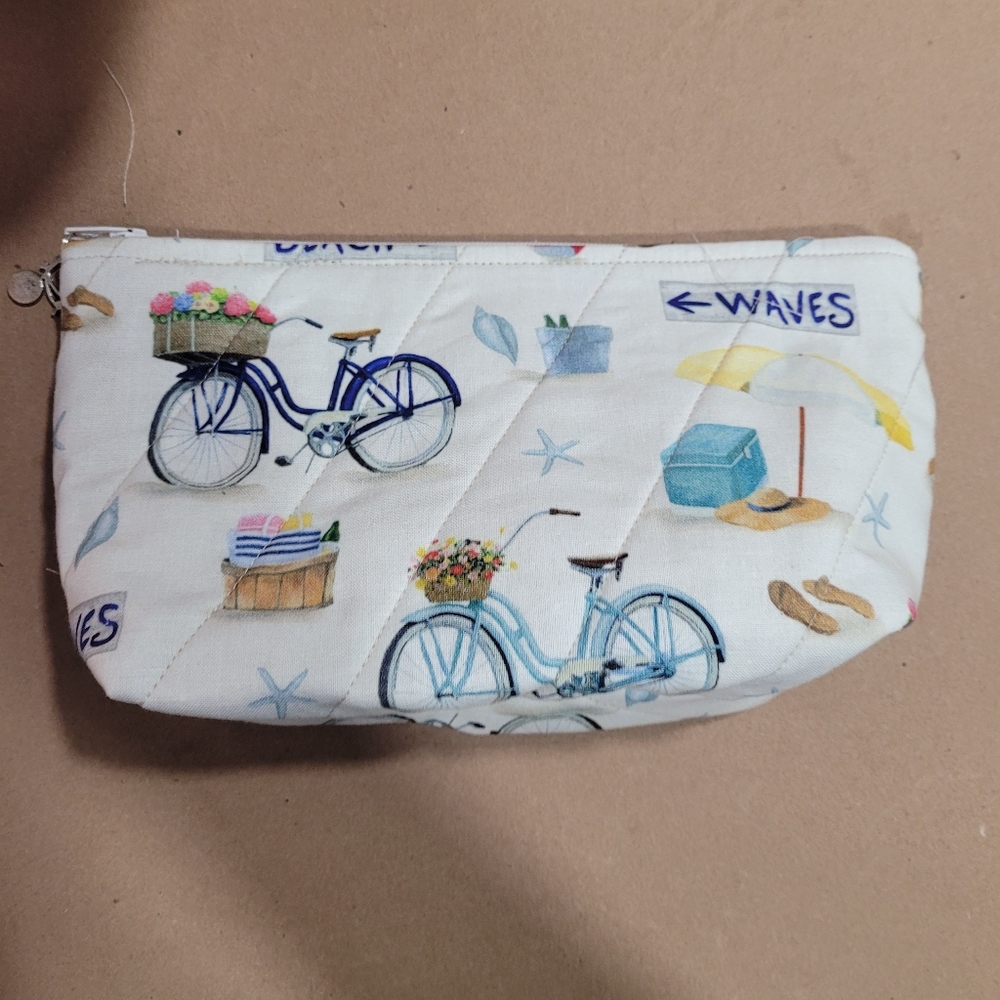 Small zippered bags.  Approximately 5x8 inches.  Perfect stocking stuffer